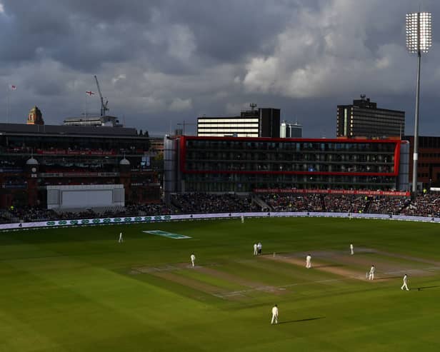 The clouds gather over the ground as England struggle in the field on the second day of the fourth Ashes cricket Test match between England and Australia at Old Trafford in Manchester, north-west England on September 5, 2019. (Photo by Paul ELLIS / AFP) / RESTRICTED TO EDITORIAL USE. NO ASSOCIATION WITH DIRECT COMPETITOR OF SPONSOR, PARTNER, OR SUPPLIER OF THE ECB (Photo credit should read PAUL ELLIS/AFP via Getty Images)