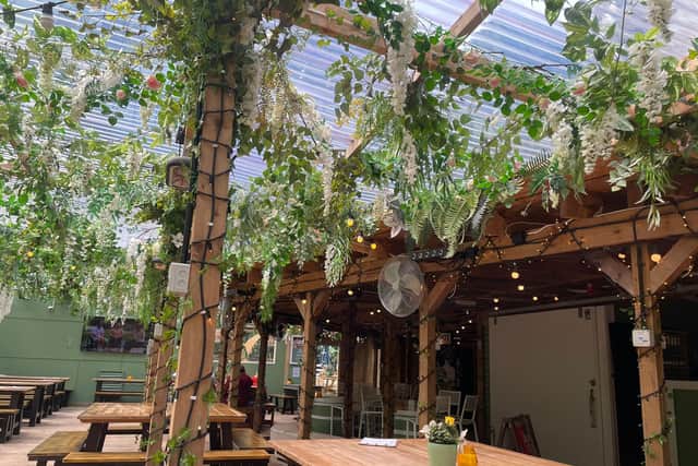 The Lawn Club has a pretty indoor-outdoor space 