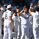 England's Chris Woakes (C) celebrates with teammates after taking the wicket of Australia's Cameron Green on the opening day of the fourth Ashes cricket Test match between England and Australia at Old Trafford cricket ground in Manchester, north-west England on July 19, 2023. 