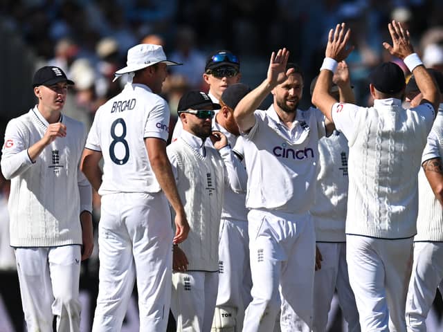 England's Chris Woakes (C) celebrates with teammates after taking the wicket of Australia's Cameron Green on the opening day of the fourth Ashes cricket Test match between England and Australia at Old Trafford cricket ground in Manchester, north-west England on July 19, 2023. 