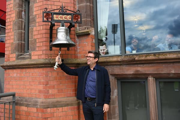 Mayor of Greater Manchester, Andy Burnham rings the 5 minute bell prior to day two of the LV= Insurance Ashes 4th Test Match between England and Australia at Emirates Old Trafford on July 21, 2023 in Manchester, England. (Photo by Stu Forster/Getty Images)