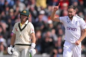 England bowler Chris Woakes celebrates after taking the wicket of David Warner during day two of the LV= Insurance Ashes 4th Test Match between England and Australia at Emirates Old Trafford on July 21, 2023 in Manchester, England. (Photo by Stu Forster/Getty Images)
