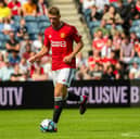 Manchester United have announced Will Fish has re-joined Hibs on loan.