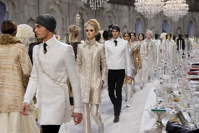 Chanel Metiers d’Art Pre-Fall collection show, entitled “Paris-Bombay” in December 2011, Paris. The collection was designed by Karl Lagerfeld. (Photo credit should read FRANCOIS GUILLOT/AFP via Getty Images)