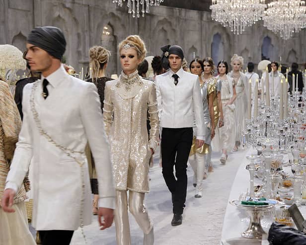 Chanel Metiers d’Art Pre-Fall collection show, entitled “Paris-Bombay” in December 2011, Paris. The collection was designed by Karl Lagerfeld. (Photo credit should read FRANCOIS GUILLOT/AFP via Getty Images)