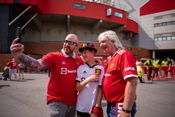Manchester United fans prior to the Premier League match between Manchester United and Fulham