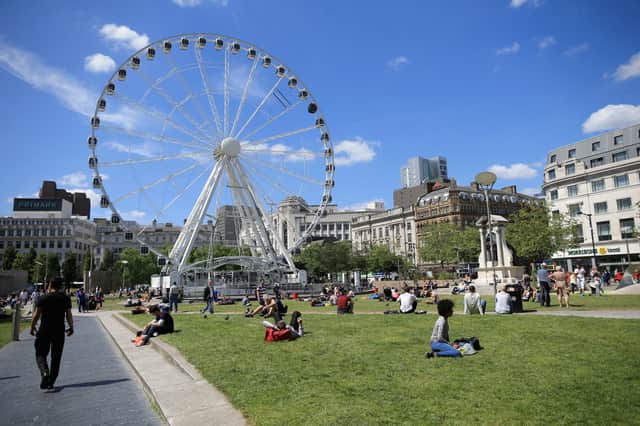 The infamous Ferris Wheel rising high above Piccadilly Gardens back in 2014