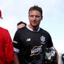 Jos Buttler of Manchester Originals looks on whilst shaking hands with players of Welsh Fire following defeat to Welsh Fire during The Hundred match between Welsh Fire Men and Manchester Originals Men at Sophia Gardens on August 02, 2023 in Cardiff, Wales. (Photo by Ryan Hiscott/Getty Images