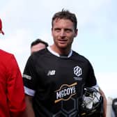 Jos Buttler of Manchester Originals looks on whilst shaking hands with players of Welsh Fire following defeat to Welsh Fire during The Hundred match between Welsh Fire Men and Manchester Originals Men at Sophia Gardens on August 02, 2023 in Cardiff, Wales. (Photo by Ryan Hiscott/Getty Images