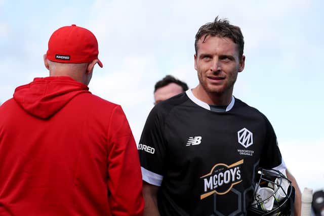 Jos Buttler of Manchester Originals looks on whilst shaking hands with players of Welsh Fire following defeat to Welsh Fire during The Hundred match between Welsh Fire Men and Manchester Originals Men at Sophia Gardens on August 02, 2023 in Cardiff, Wales. (Photo by Ryan Hiscott/Getty Images