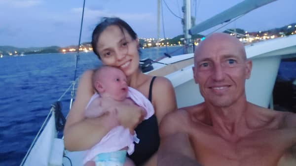 Iuliia Gurzhii, 38, and husband, Clive, 51, with daughter Louisa.