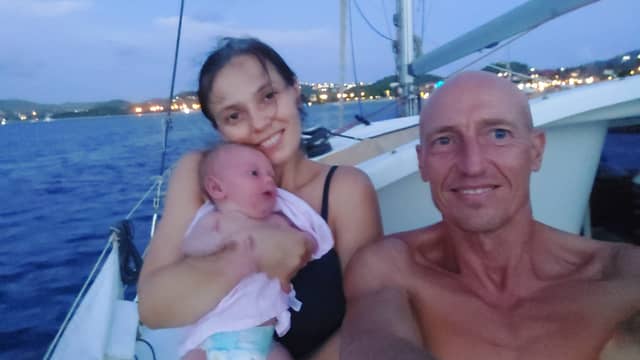 Iuliia Gurzhii, 38, and husband, Clive, 51, with daughter Louisa.