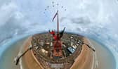 Two thrill-seekers have taken the ultimate selfie with the red arrows