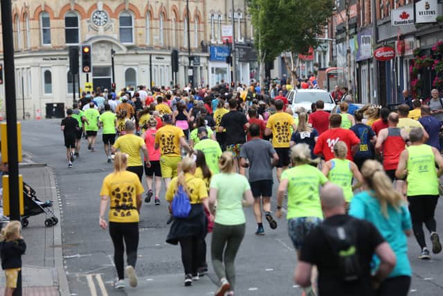Runners take part in last year’s RunThrough Altrincham 10k. This year the race will take place on Sunday 17 September. Credit: RunThrough Altrincham 10k 