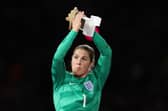 Man Utd's Mary Earps with her Golden Glove trophy after being named the best goalkeeper at the Women's World Cup