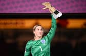 Mary Earps poses after receiving the 'Golden Glove' award at the end of the Australia and New Zealand 2023 Women's World Cup final football match between Spain and England at Stadium Australia in Sydney on August 20, 2023. (Photo by FRANCK FIFE / AFP) (Photo by FRANCK FIFE/AFP via Getty Images)