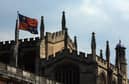 The flag of Eton College flies above Upper School and College Chapel on May 21, 2008 in Eton, England. 