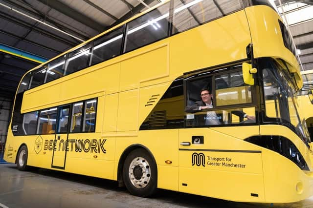 Greater Manchester mayor Andy Burnham inside one of the new Bee Network buses..