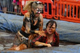 Two women get stuck in at the World Gravy Wrestling Championships