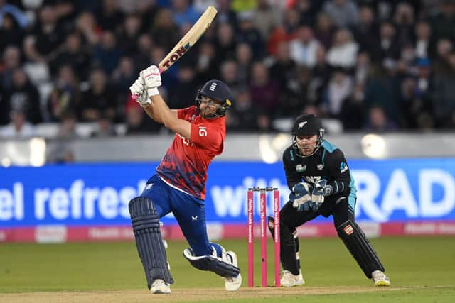 England batsman Dawid Malan hits out watched by wicketkeeper Tim Seifert during the 1st Vitality T20 I match between England and New Zealand at Emirates Riverside on August 30, 2023 in Chester-le-Street, England. (Photo by Stu Forster/Getty Images)