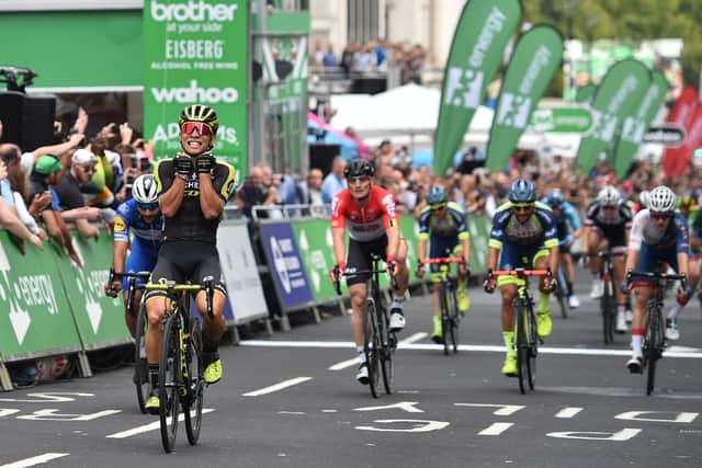 Australia's Caleb Ewan riding for Mitchelton-Scott celebrates after winning the 77km final stage of the Tour of Britain (Photo by Glyn KIRK / AFP) (Photo credit should read GLYN KIRK/AFP via Getty Images)