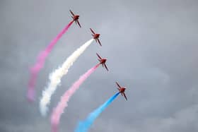 The Red Arrows perform at RAF Fairford during the Royal Military Air Tattoo on July 15, 2023 in Fairford, England. Up to 150,000 people are expected to attend The Royal International Air Tattoo this weekend. It is the world's largest military air show, held annually in July, in support of The Royal Air Force Charitable Trust. (Photo by Matthew Horwood/Getty Images)