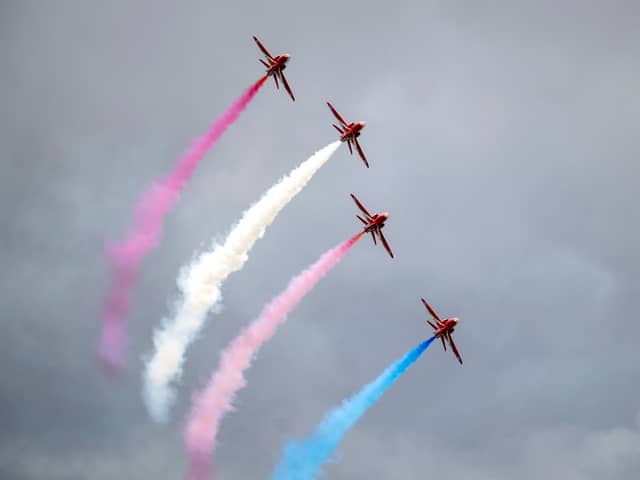 The Red Arrows perform at RAF Fairford during the Royal Military Air Tattoo on July 15, 2023 in Fairford, England. Up to 150,000 people are expected to attend The Royal International Air Tattoo this weekend. It is the world's largest military air show, held annually in July, in support of The Royal Air Force Charitable Trust. (Photo by Matthew Horwood/Getty Images)