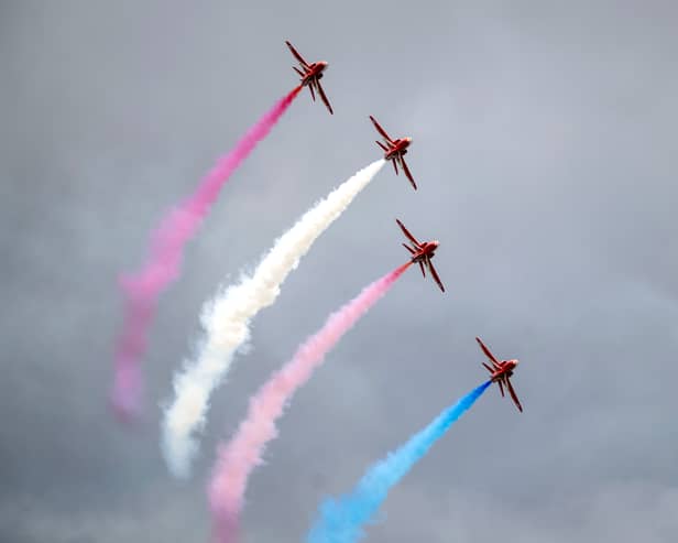 The Red Arrows perform at RAF Fairford during the Royal Military Air Tattoo on July 15, 2023 in Fairford, England. Up to 150,000 people are expected to attend The Royal International Air Tattoo this weekend. It is the world's largest military air show, held annually in July, in support of The Royal Air Force Charitable Trust. (Photo by Matthew Horwood/Getty Images)