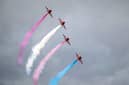 The Red Arrows perform at RAF Fairford during the Royal Military Air Tattoo on July 15, 2023 in Fairford, England. Up to 150,000 people are expected to attend The Royal International Air Tattoo this weekend. It is the world's largest military air show, held annually in July, in support of The Royal Air Force Charitable Trust. (Photo by Matthew Horwood/Getty Images)