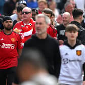 Manchester United fans arrive at Old Trafford (Image: Getty Images)