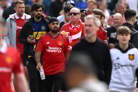 Manchester United fans arrive at Old Trafford (Image: Getty Images)