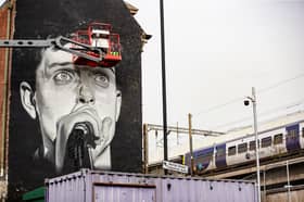 The iconic mural of the late Joy Division frontman Ian Curtis has been recreated