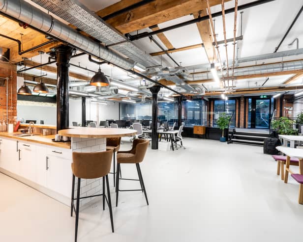 Inside the canal-side Running Total office on Brazil Street