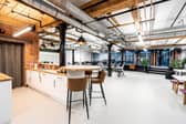 Inside the canal-side Running Total office on Brazil Street