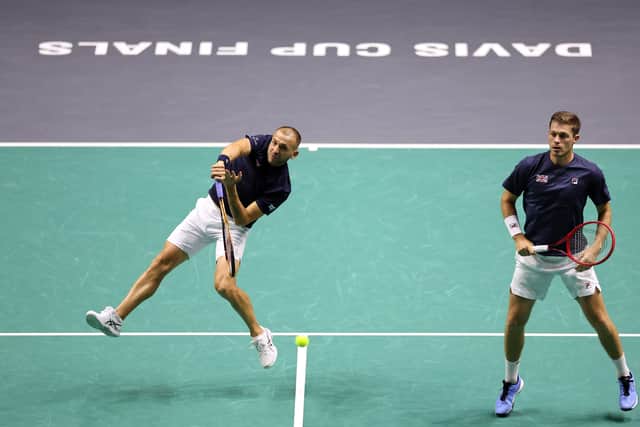 Dan Evans and Neal Skupski of Great Britain in action against Matthew Ebden of Australia and Max Purcell of Australia during day two of the 2023 Davis Cup finals group stage match at Manchester AO Arena on September 13, 2023 in Manchester, England. (Photo by Jan Kruger/Getty Images for ITF)