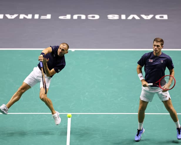 Dan Evans and Neal Skupski of Great Britain in action against Matthew Ebden of Australia and Max Purcell of Australia during day two of the 2023 Davis Cup finals group stage match at Manchester AO Arena on September 13, 2023 in Manchester, England. (Photo by Jan Kruger/Getty Images for ITF)