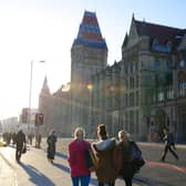 Students walk down Oxford Road outside the University of Manchester. Credit: University of Manchester