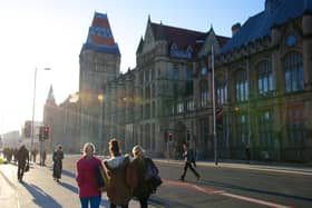 Students walk down Oxford Road outside the University of Manchester. Credit: University of Manchester