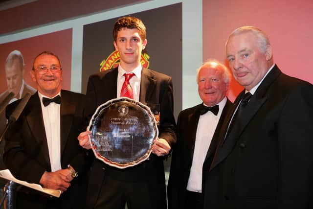 Craig Cathcart is presented with his Academy Player of the Year award (Photo by Tom Purslow/Manchester United via Getty Images)
