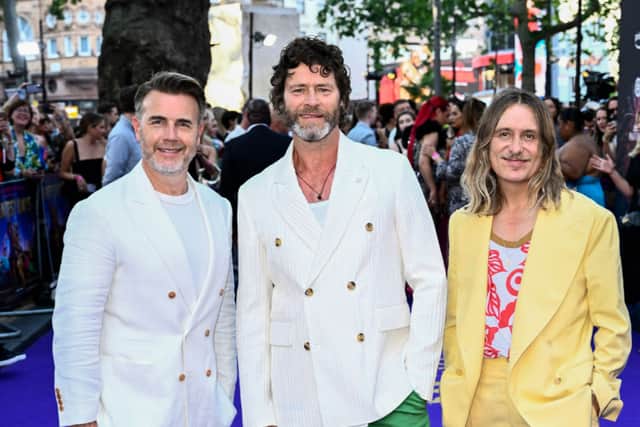 Take That (L-R) Gary Barlow, Howard Donald and Mark Owen (Photo by Gareth Cattermole/Getty Images)