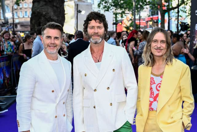 Take That (L-R) Gary Barlow, Howard Donald and Mark Owen  (Photo by Gareth Cattermole/Getty Images)