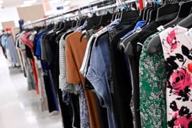 Clothes hanging in shop Picture: Getty