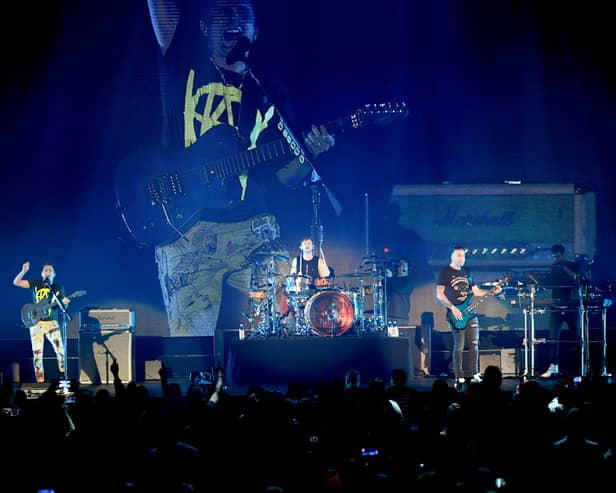 Matthew Bellamy, Dominic Howard, and Chris Wolstenholme of Muse perform onstage during the 2023 iHeartRadio ALTer EGO at The Kia Forum on January 14, 2023 in Inglewood, California. (Photo by JC Olivera/Getty Images)