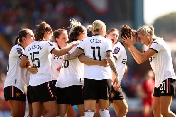 Lucia Garcia of Manchester United celebrates with Millie Turner after scoring her sides first goal during the FA Women's Super League match between Liverpool and Manchester United at Prenton Park on May 27, 2023 in Birkenhead, England. (Photo by Naomi Baker/Getty Images)