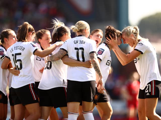Lucia Garcia of Manchester United celebrates with Millie Turner after scoring her sides first goal during the FA Women's Super League match between Liverpool and Manchester United at Prenton Park on May 27, 2023 in Birkenhead, England. (Photo by Naomi Baker/Getty Images)