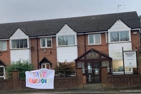 A banner outside Elizabeth House makes someone's feelings knowns