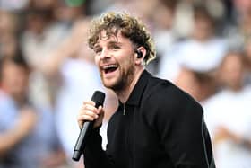 Tom Grennan performs at half time during the NFL match between Atlanta Falcons and Jacksonville Jaguars at Wembley Stadium on October 01, 2023 in London, England. (Photo by Justin Setterfield/Getty Images)