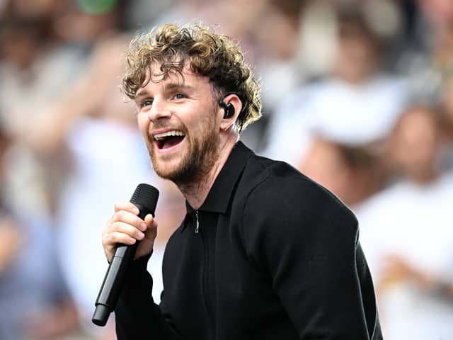 Tom Grennan performs at half time during the NFL match between Atlanta Falcons and Jacksonville Jaguars at Wembley Stadium on October 01, 2023 in London, England. (Photo by Justin Setterfield/Getty Images)