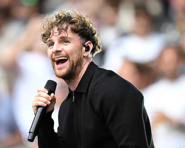 Tom Grennan performs at half time during the NFL match between Atlanta Falcons and Jacksonville Jaguars at Wembley Stadium on October 01, 2023 in London, England. (Photo by Justin Setterfield/Getty Images)