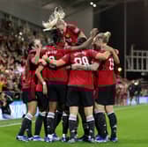 Manchester United players celebrate Melvine Malard's 80th minute strike. Cr. Getty Images.